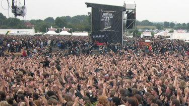 Huge crowds enjoy the Wacken Open Air heavy metal music festival.