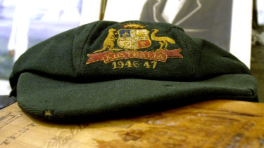 A baggy green cap which belonged to cricketing legend Sir Donald Bradman.