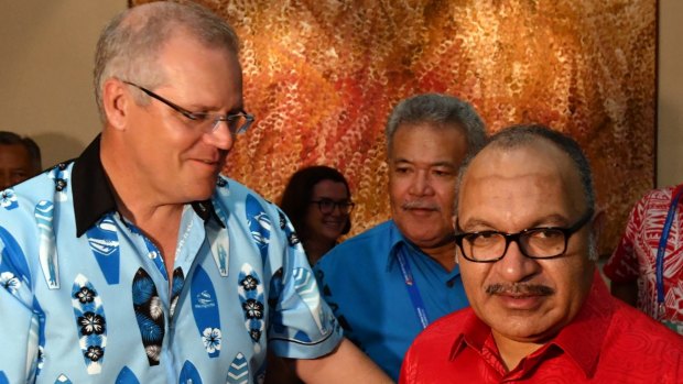 Prime Minister Scott Morrison with Papua New Guinea's Prime Minister Peter O'Neill after APEC last year.