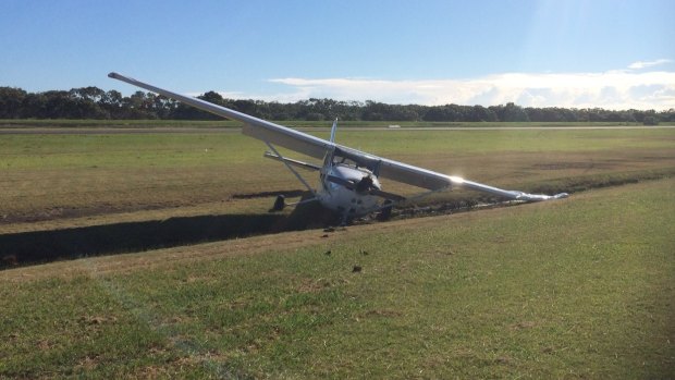 The light aircraft "came down" at Redcliffe aerodrome on Monday morning, police said.
