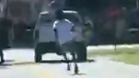 Ahmaud Arbery is shown on mobile phone footage running on a street in a neighbourhood outside Brunswick in Georgia in February last year.