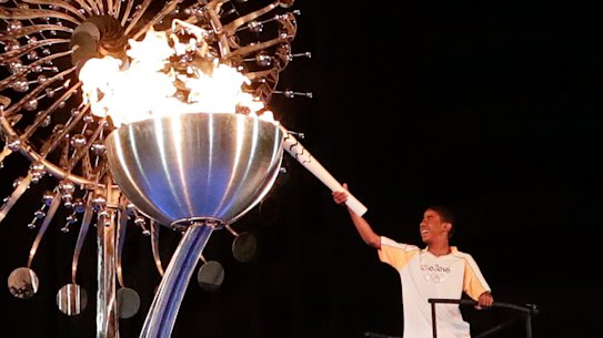 The flame is lit at the opening ceremony of the 2016 Rio de Janerio Olympics. The Queensland Opposition is backing a Brisbane bid.