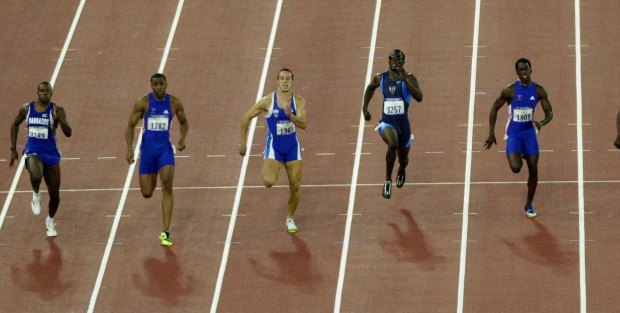 Kon Kenteris races towards the finish line in the 200-metre final of the 2000 Olympic Games.