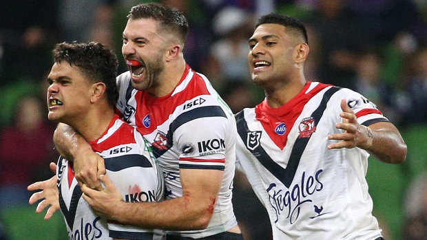 Freakish talent: The Roosters celebrate Latrell Mitchell's match-winner.