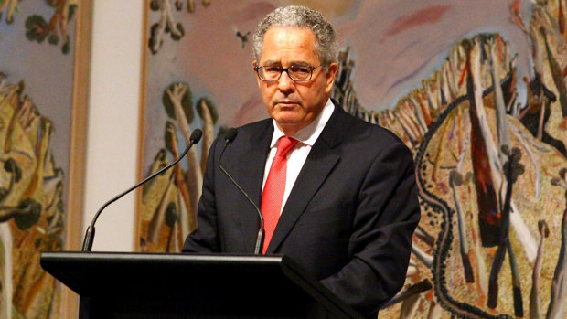 Peter Carne, pictured in 2014 while speaking at the memorial service for former premier Wayne Goss.