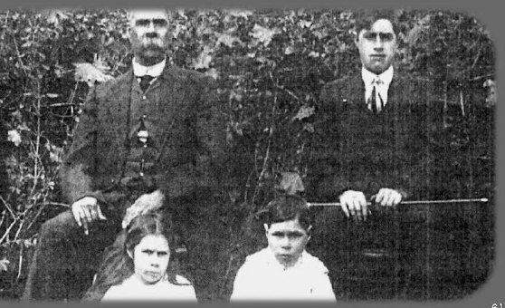 William Cooper, left, his eldest son, Daniel, daughter Amy and son Lynch.  Among Cooper’s many tribulations, Daniel was killed in World War I in Belgium on September 20, 1917.