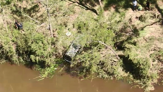 Two Chinese tourists were killed after their car was inundated near Kilkivan, about 230 kilometres north of Brisbane.