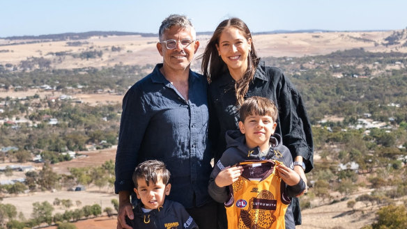 Former Hawthorn player Chance Bateman with his wife and family.