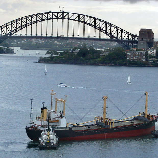 The North Korean drug-running vessel the Pong Su being brought into Sydney Harbour under police guard in 2003.
