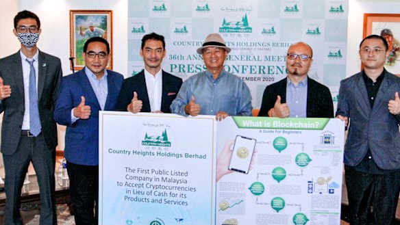 Hypertech’s Ryan Xu (far right) and Kevin Chen (second from the right) in 2020 joining the board of Malaysian public company, Country Heights Holdings.