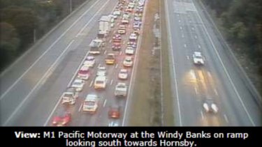 traffic m1 crash car truck standstill brings citybound queued following between