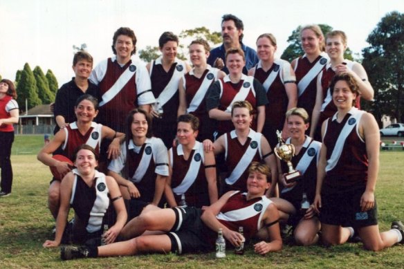 Yvette Andrews (third from the left) celebrates after winning the inaugural Sydney Women’s AFL premiership with her teammates at the Western Wolves.