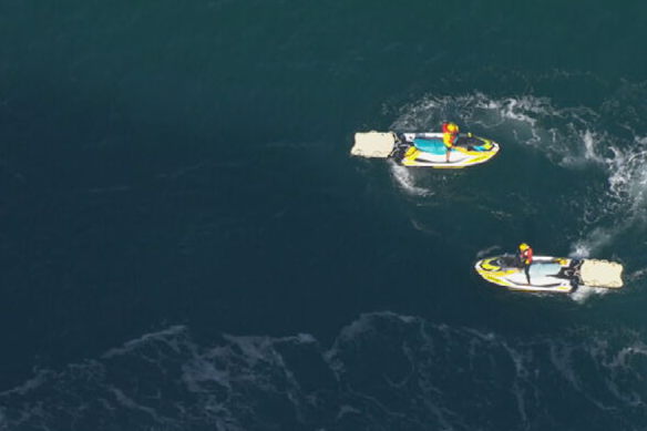 Authorities are still searching for a man swept off the rocks at the beach near San Remo.
