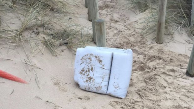 A seat cushion from the plane was found on a beach at Surtainville, France.