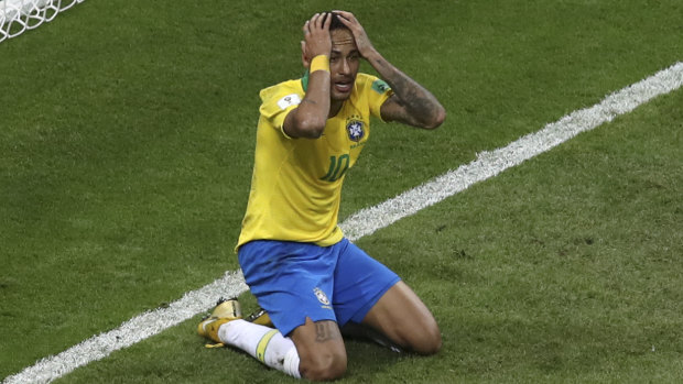 Hands on heads: Neymar reacts to a missed opportunity, or being denied a penalty - it's hard to tell.