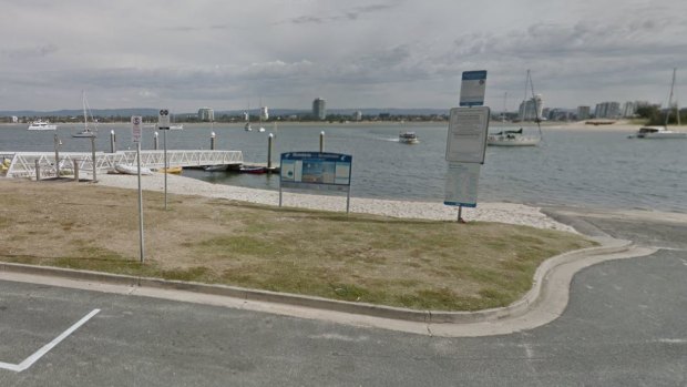 A man was pulled unconscious from the water off Muriel Henchman Drive at the Gold Coast.