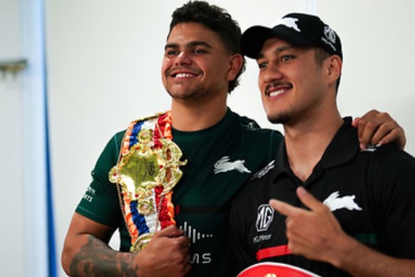 Souths star Latrell Mitchell with cruiserweight world champion Jai Opetaia.