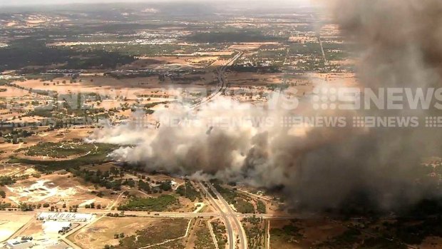 The fire takes hold in Forrestdale.