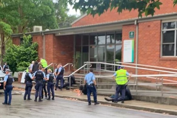 Police at Forestville Memorial Hall during the operation.