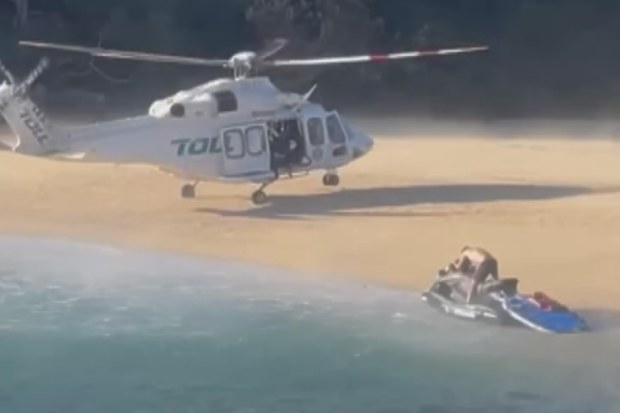 A US spear fisher has died after being caught in a rip at a Manly beach.