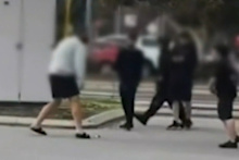 A 14-year-old boy, part of a gang of teens, was filmed taunting a Good Samaritan (dressed in a white jumper) and surrounding him outside a fast food outlet in Falcon, south of Perth.
