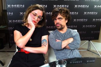 Bastow and actor Peter Dinklage on a media junket in 2014.