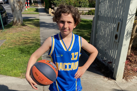 Ezra the basketball player and
keen Milwaukee Bucks fan.