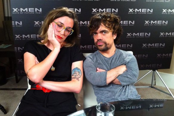 Bastow and actor Peter Dinklage on a media junket in 2014.