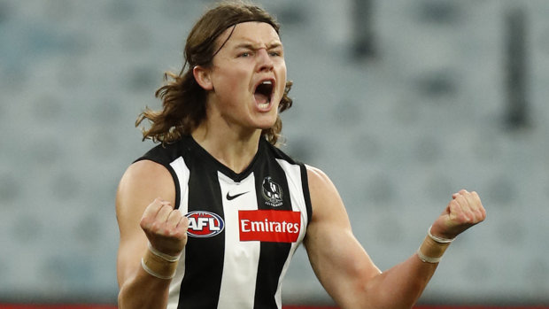 Jack Ginnivan celebrates his first AFL goal.