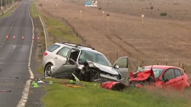 Police attend the scene of a head-on collision in Truganina, Melbourne, on July 8. A 10-year-old girl and four-year-old boy have died. 