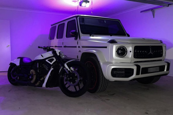 Luxury vehicles at the home of one of the Haddara syndicate members.