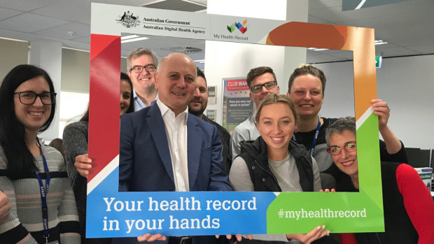 Tim Kelsey (centre), head the Australian Digital Health Agency, which is rolling out My Health Record.