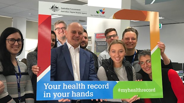 Tim Kelsey (centre), head the Australian Digital Health Agency, which is rolling out My Health Record.