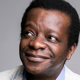 Stephen K Amos.