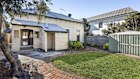 Fixer-upper: The three-bedroom house at 1 Peel Street in Melbourne’s Newport sold under the hammer for $1.2 million. 