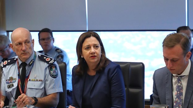 Steve Gollschewski with Premier Annastacia Palaszczuk and her deputy, Steven Miles.