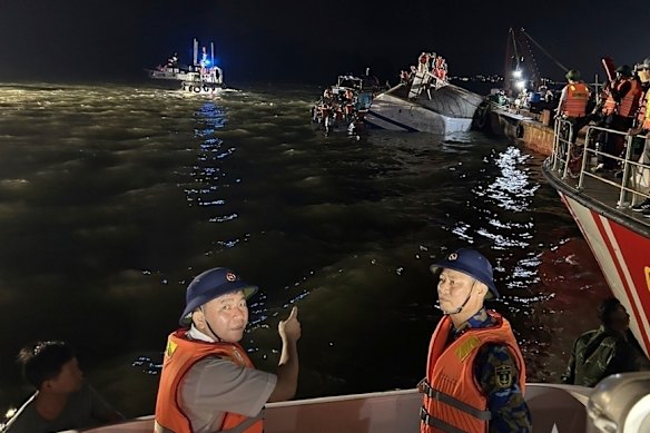 Rescue workers search for survivors after a tourist boat capsized in Halong Bay, Vietnam.