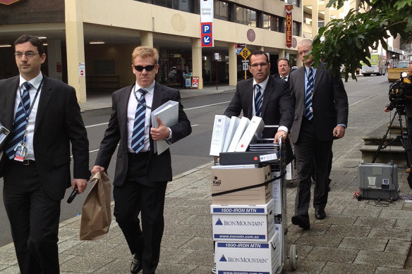 Forensic lead Mark Reynolds (far right) was one of the investigators who arrived on day one of Lloyd Rayney’s murder trial in custom-made matching ties. A member of the investigative team referred to the ties as being part of a “tribalism” culture within police.  