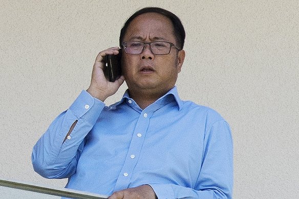 Huang Xiangmo on the balcony of his former Mosman home.