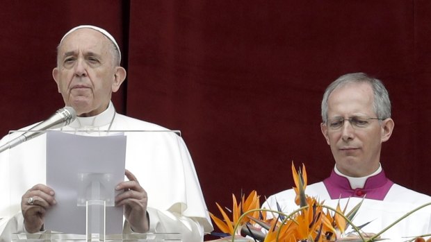 Close to the Christians of Sri Lanka: Pope Francis delivers his "Urbi et Orbi" ("to the city and the world") message in St Peter's Square at the Vatican. 