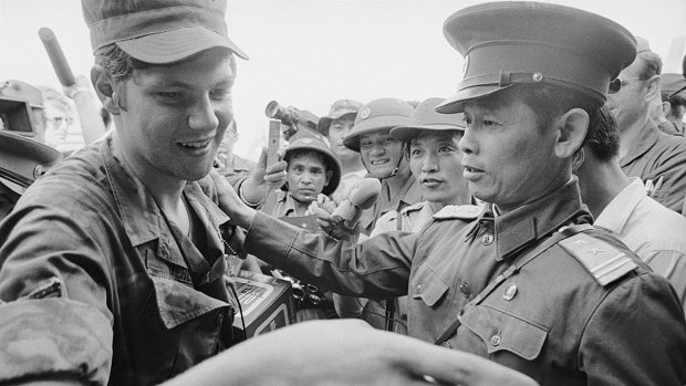 North Vietnamese Army Officer Bui Tin (right) with a sergeant in the Air Force as the last US combat troops depart from Vietnam in 1973.  