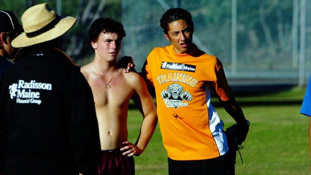 Benji Marshall training in a Tigers shirt with Keebra Park back in 2003.