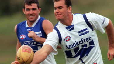 Wayne Carey and Anthony Stevens during their playing days at North Melbourne.