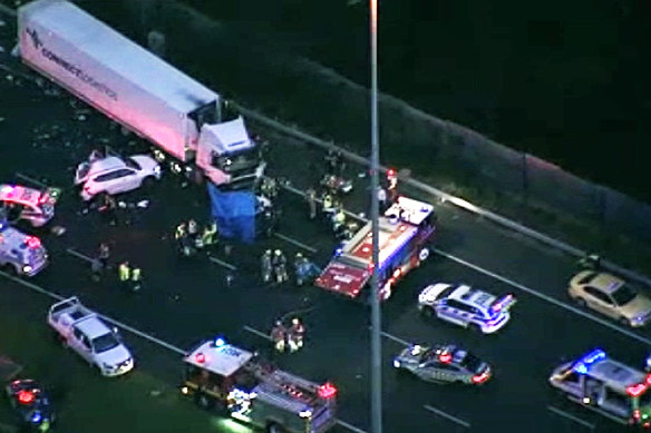 The crash scene on Wednesday night. Mr Bougias' cab is seen on the right.