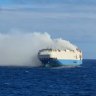 Ship carrying 1100 Porsches and other luxury cars is burning and adrift