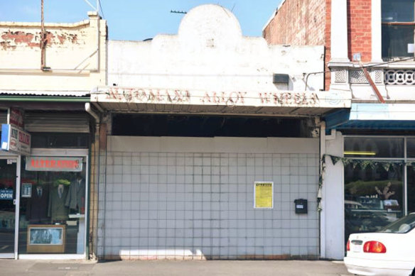 The boarded-up Footscray shop where a family plans to build their eight-storey home.