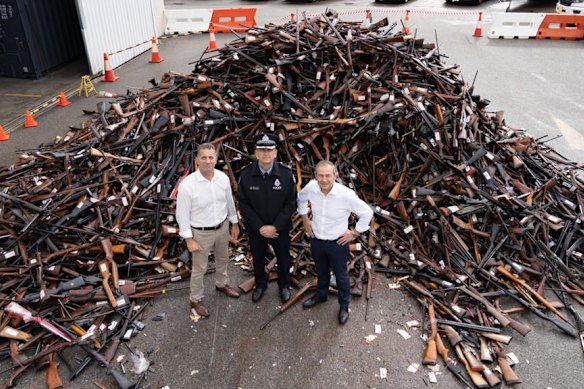 WA Premier Roger Cook, former WA police minister Paul Papalia and Police Commissioner Col Blanch with guns collected during a buyback.