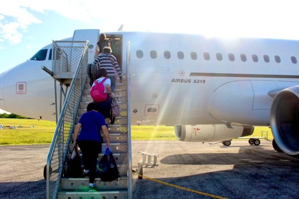 Australians who were evacuated from Wuhan leave Christmas Island on Tuesday.