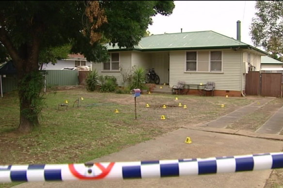 Police say the woman was found in the front yard of the Deniliquin home.