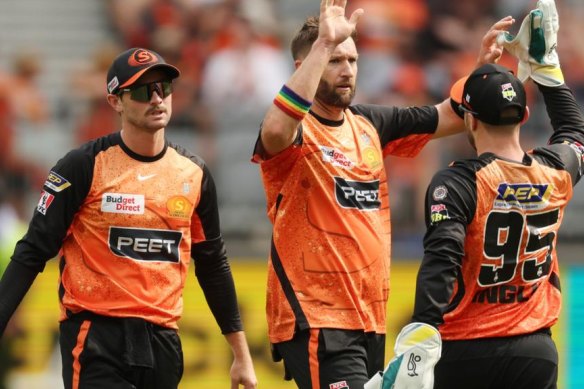 Andrew Tye of the Scorchers celebrates after taking the wicket of Heat’s Nathan McSweeney.